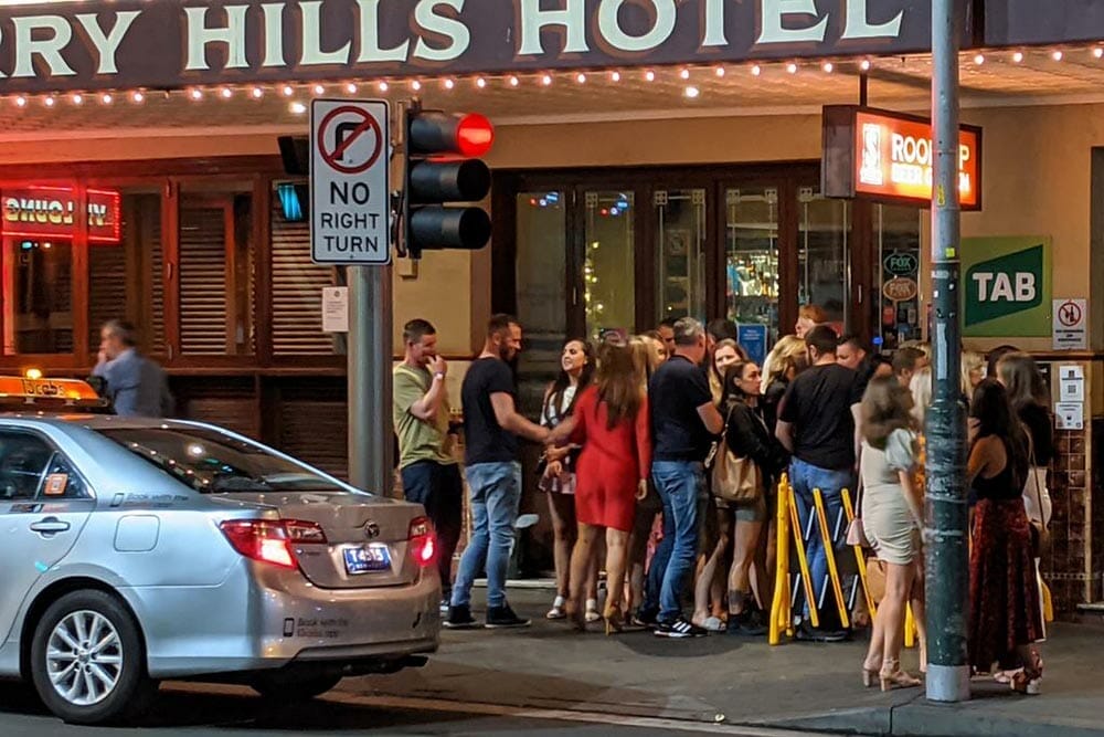people-waiting-outside-bar-in-sydney