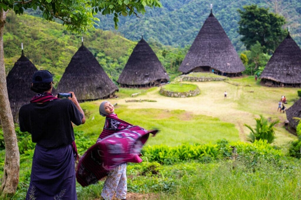 girl-standing-at-wae-rebo-village-flores