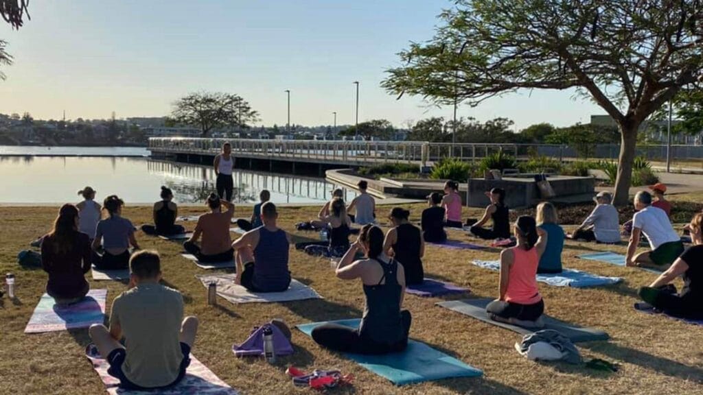 Waterfront-Sunrise-Yoga_Enriching-Communities-Newstead_FB-1 - Londoner In Sydney Free yoga class after a first light stroll sunrise in brisbane
